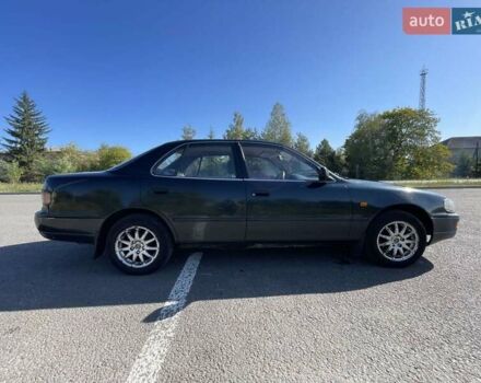 Зеленый Тойота Камри, объемом двигателя 2.16 л и пробегом 490 тыс. км за 2200 $, фото 4 на Automoto.ua