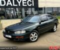 Зеленый Тойота Камри, объемом двигателя 3 л и пробегом 404 тыс. км за 2800 $, фото 1 на Automoto.ua