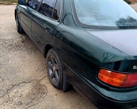 Зелений Тойота Камрі, об'ємом двигуна 2.2 л та пробігом 350 тис. км за 2150 $, фото 5 на Automoto.ua