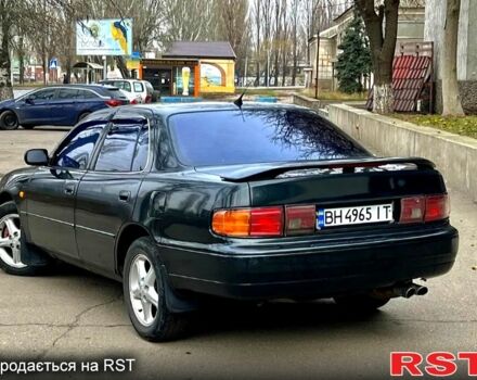 Зеленый Тойота Камри, объемом двигателя 3 л и пробегом 404 тыс. км за 2800 $, фото 2 на Automoto.ua