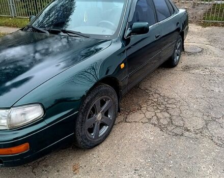 Зелений Тойота Камрі, об'ємом двигуна 2.2 л та пробігом 350 тис. км за 2150 $, фото 3 на Automoto.ua