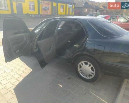 Зеленый Тойота Камри, объемом двигателя 3 л и пробегом 347 тыс. км за 2800 $, фото 6 на Automoto.ua