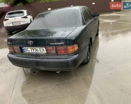 Зелений Тойота Камрі, об'ємом двигуна 2.2 л та пробігом 360 тис. км за 1550 $, фото 5 на Automoto.ua