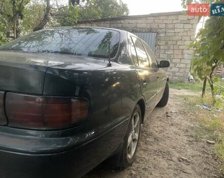 Зелений Тойота Камрі, об'ємом двигуна 3 л та пробігом 400 тис. км за 2800 $, фото 4 на Automoto.ua