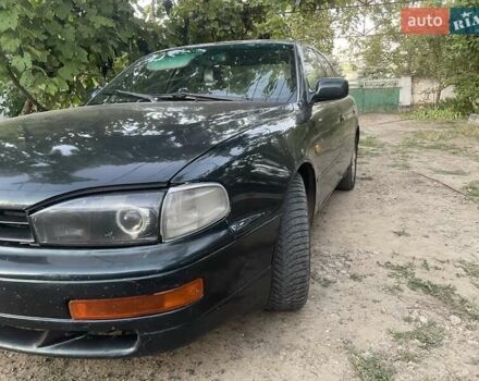 Зелений Тойота Камрі, об'ємом двигуна 3 л та пробігом 400 тис. км за 2800 $, фото 7 на Automoto.ua