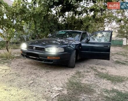 Зелений Тойота Камрі, об'ємом двигуна 3 л та пробігом 400 тис. км за 2800 $, фото 1 на Automoto.ua