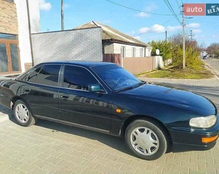 Зеленый Тойота Камри, объемом двигателя 3 л и пробегом 347 тыс. км за 2800 $, фото 7 на Automoto.ua