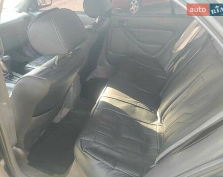 Зеленый Тойота Камри, объемом двигателя 3 л и пробегом 347 тыс. км за 2800 $, фото 5 на Automoto.ua