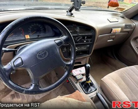 Зеленый Тойота Камри, объемом двигателя 2.2 л и пробегом 235 тыс. км за 2100 $, фото 7 на Automoto.ua