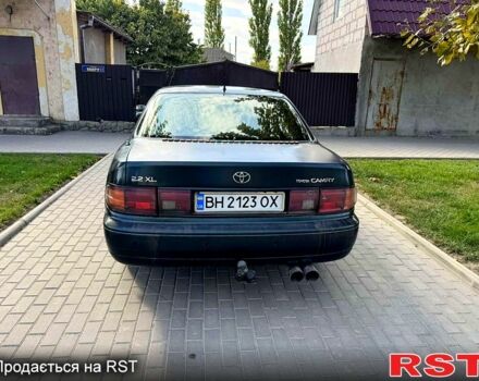 Зеленый Тойота Камри, объемом двигателя 2.2 л и пробегом 235 тыс. км за 2100 $, фото 2 на Automoto.ua
