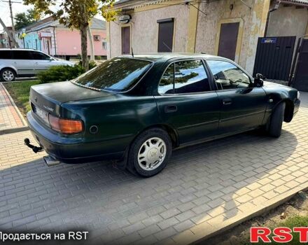 Зеленый Тойота Камри, объемом двигателя 2.2 л и пробегом 235 тыс. км за 2100 $, фото 1 на Automoto.ua