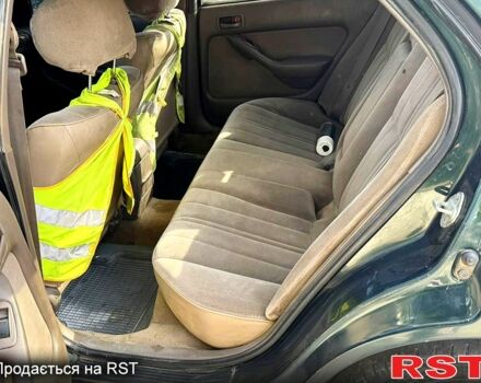 Зеленый Тойота Камри, объемом двигателя 2.2 л и пробегом 235 тыс. км за 2100 $, фото 5 на Automoto.ua