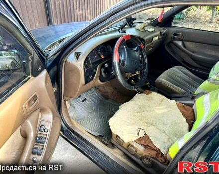 Зеленый Тойота Камри, объемом двигателя 2.2 л и пробегом 235 тыс. км за 2100 $, фото 6 на Automoto.ua