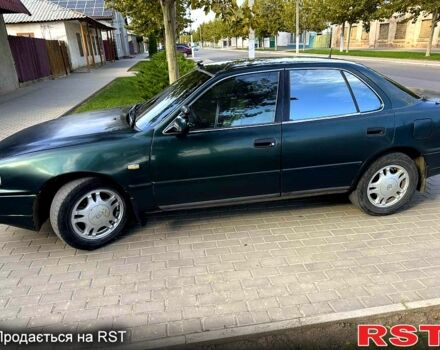 Зеленый Тойота Камри, объемом двигателя 2.2 л и пробегом 235 тыс. км за 2100 $, фото 4 на Automoto.ua