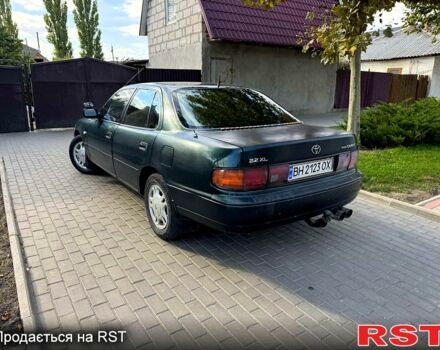 Зеленый Тойота Камри, объемом двигателя 2.2 л и пробегом 235 тыс. км за 2100 $, фото 3 на Automoto.ua