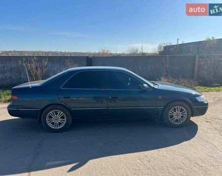 Зеленый Тойота Камри, объемом двигателя 2.16 л и пробегом 407 тыс. км за 3700 $, фото 5 на Automoto.ua