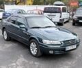 Зеленый Тойота Камри, объемом двигателя 3 л и пробегом 255 тыс. км за 4999 $, фото 1 на Automoto.ua