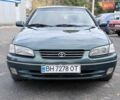 Зеленый Тойота Камри, объемом двигателя 3 л и пробегом 255 тыс. км за 4999 $, фото 1 на Automoto.ua