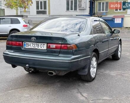 Зеленый Тойота Камри, объемом двигателя 3 л и пробегом 255 тыс. км за 4999 $, фото 5 на Automoto.ua