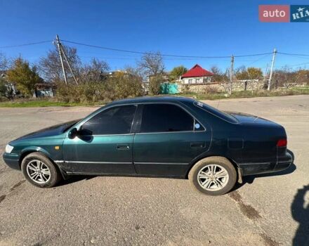 Зеленый Тойота Камри, объемом двигателя 2.16 л и пробегом 407 тыс. км за 3700 $, фото 10 на Automoto.ua