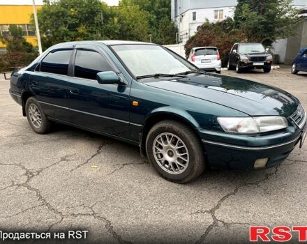 Зелений Тойота Камрі, об'ємом двигуна 3 л та пробігом 187 тис. км за 3777 $, фото 4 на Automoto.ua