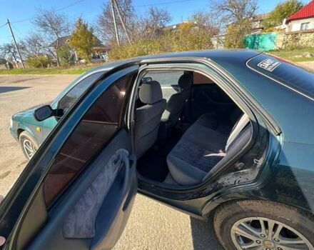 Зеленый Тойота Камри, объемом двигателя 2.16 л и пробегом 407 тыс. км за 3700 $, фото 11 на Automoto.ua