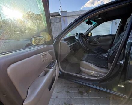 Зелений Тойота Камрі, об'ємом двигуна 3 л та пробігом 394 тис. км за 3900 $, фото 12 на Automoto.ua