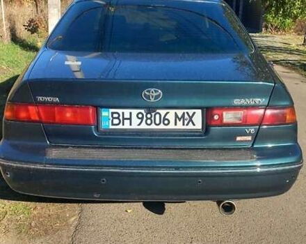 Зелений Тойота Камрі, об'ємом двигуна 3 л та пробігом 394 тис. км за 3900 $, фото 6 на Automoto.ua