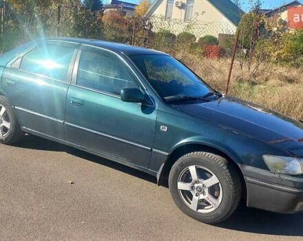 Зелений Тойота Камрі, об'ємом двигуна 3 л та пробігом 394 тис. км за 3900 $, фото 5 на Automoto.ua