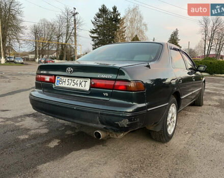 Зеленый Тойота Камри, объемом двигателя 3 л и пробегом 355 тыс. км за 3400 $, фото 3 на Automoto.ua