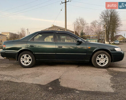 Зеленый Тойота Камри, объемом двигателя 3 л и пробегом 355 тыс. км за 3400 $, фото 2 на Automoto.ua