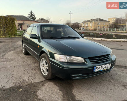 Зеленый Тойота Камри, объемом двигателя 3 л и пробегом 355 тыс. км за 3400 $, фото 1 на Automoto.ua