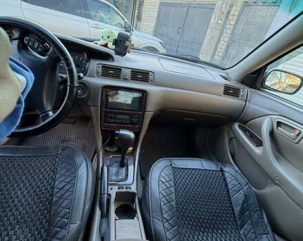 Зелений Тойота Камрі, об'ємом двигуна 3 л та пробігом 394 тис. км за 3900 $, фото 9 на Automoto.ua