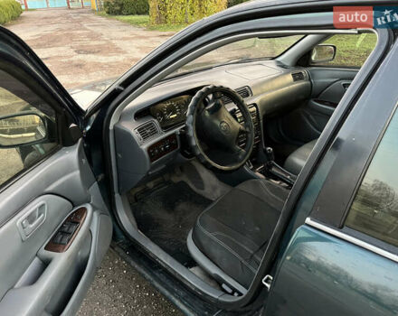 Зеленый Тойота Камри, объемом двигателя 3 л и пробегом 355 тыс. км за 3400 $, фото 9 на Automoto.ua