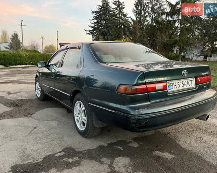 Зеленый Тойота Камри, объемом двигателя 3 л и пробегом 355 тыс. км за 3400 $, фото 5 на Automoto.ua