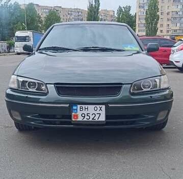 Зеленый Тойота Камри, объемом двигателя 2.16 л и пробегом 385 тыс. км за 5000 $, фото 1 на Automoto.ua