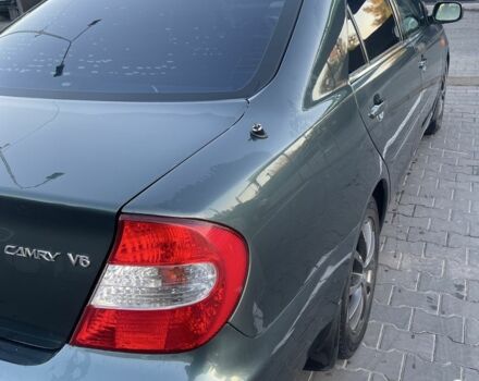 Зелений Тойота Камрі, об'ємом двигуна 3 л та пробігом 384 тис. км за 7300 $, фото 1 на Automoto.ua