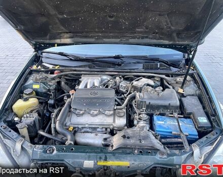 Зеленый Тойота Камри, объемом двигателя 3 л и пробегом 384 тыс. км за 6500 $, фото 7 на Automoto.ua