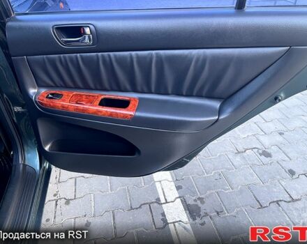 Зеленый Тойота Камри, объемом двигателя 3 л и пробегом 384 тыс. км за 6500 $, фото 4 на Automoto.ua