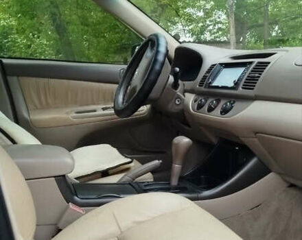 Зеленый Тойота Камри, объемом двигателя 2.4 л и пробегом 430 тыс. км за 4999 $, фото 9 на Automoto.ua