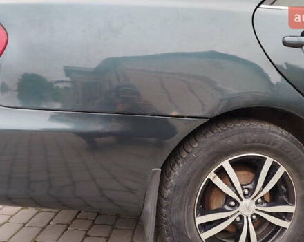 Зеленый Тойота Камри, объемом двигателя 2.4 л и пробегом 430 тыс. км за 4999 $, фото 13 на Automoto.ua