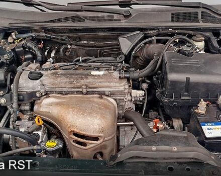 Зеленый Тойота Камри, объемом двигателя 2.4 л и пробегом 333 тыс. км за 5200 $, фото 7 на Automoto.ua