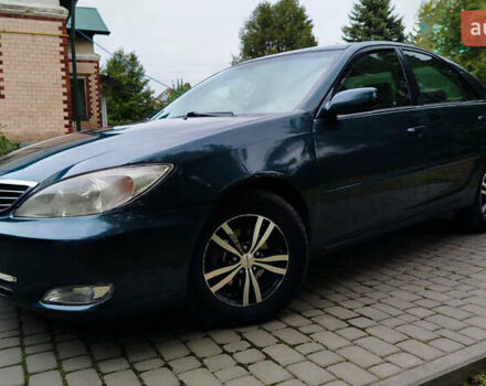 Зеленый Тойота Камри, объемом двигателя 2.4 л и пробегом 430 тыс. км за 4999 $, фото 5 на Automoto.ua