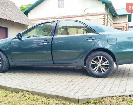 Зеленый Тойота Камри, объемом двигателя 2.4 л и пробегом 430 тыс. км за 4999 $, фото 3 на Automoto.ua