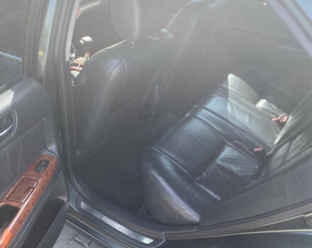 Зелений Тойота Камрі, об'ємом двигуна 2.4 л та пробігом 256 тис. км за 6000 $, фото 9 на Automoto.ua