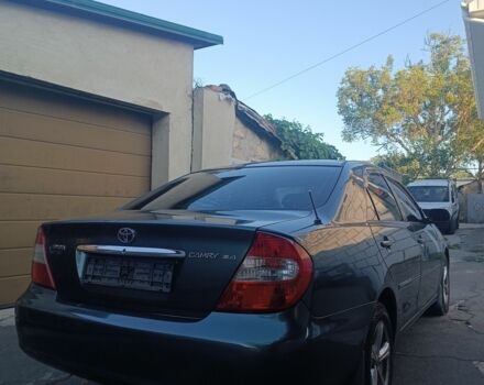 Зеленый Тойота Камри, объемом двигателя 2.4 л и пробегом 225 тыс. км за 5300 $, фото 5 на Automoto.ua