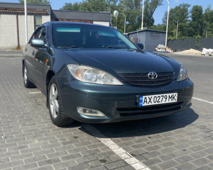 Зелений Тойота Камрі, об'ємом двигуна 2.4 л та пробігом 256 тис. км за 6000 $, фото 1 на Automoto.ua