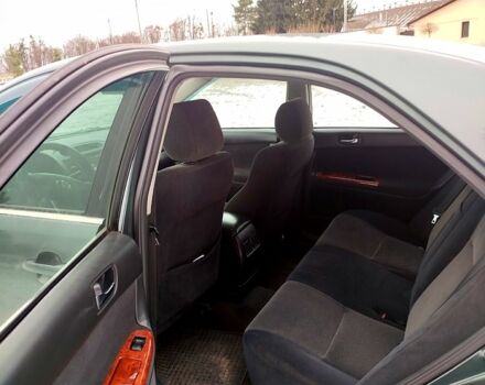 Зеленый Тойота Камри, объемом двигателя 2.4 л и пробегом 333 тыс. км за 5200 $, фото 5 на Automoto.ua