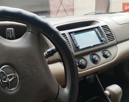 Зеленый Тойота Камри, объемом двигателя 2.4 л и пробегом 430 тыс. км за 4999 $, фото 8 на Automoto.ua