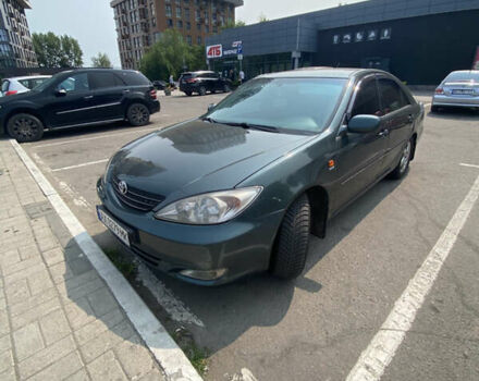 Зелений Тойота Камрі, об'ємом двигуна 2.4 л та пробігом 256 тис. км за 6000 $, фото 6 на Automoto.ua